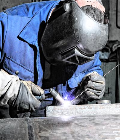 Worker working in JCBL plant